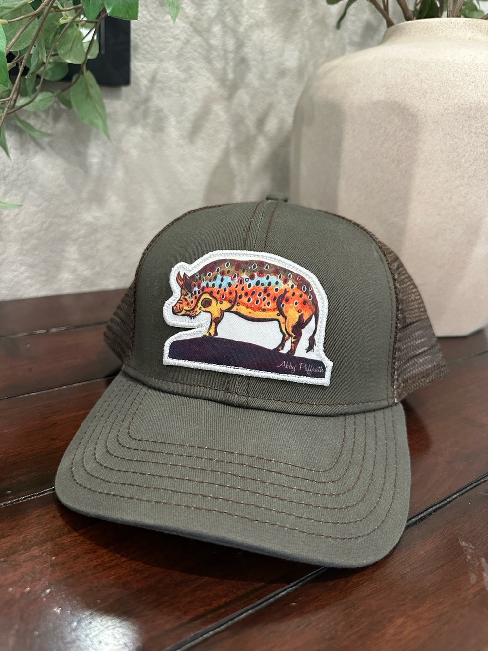 Olive Green Trucker Hat with Colorful Rhino Patch